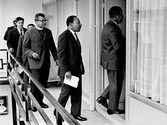 Dr. Martin Luther King Jr. and the Rev. James M. Lawson Jr. follows the Rev. Ralph Abernathy into Room 307 at the Lorraine Motel on April 3, 1968.