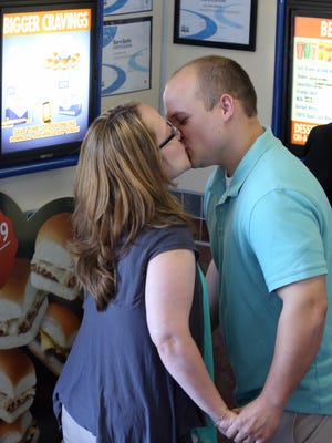 Kristina Jones and her new husband, Michael Rowley, both of Old Bridge, N.J., shared a kiss after exchanging wedding vows May 20, 2016, at a White Castle fast-food restaurant in Sayreville, N.J.