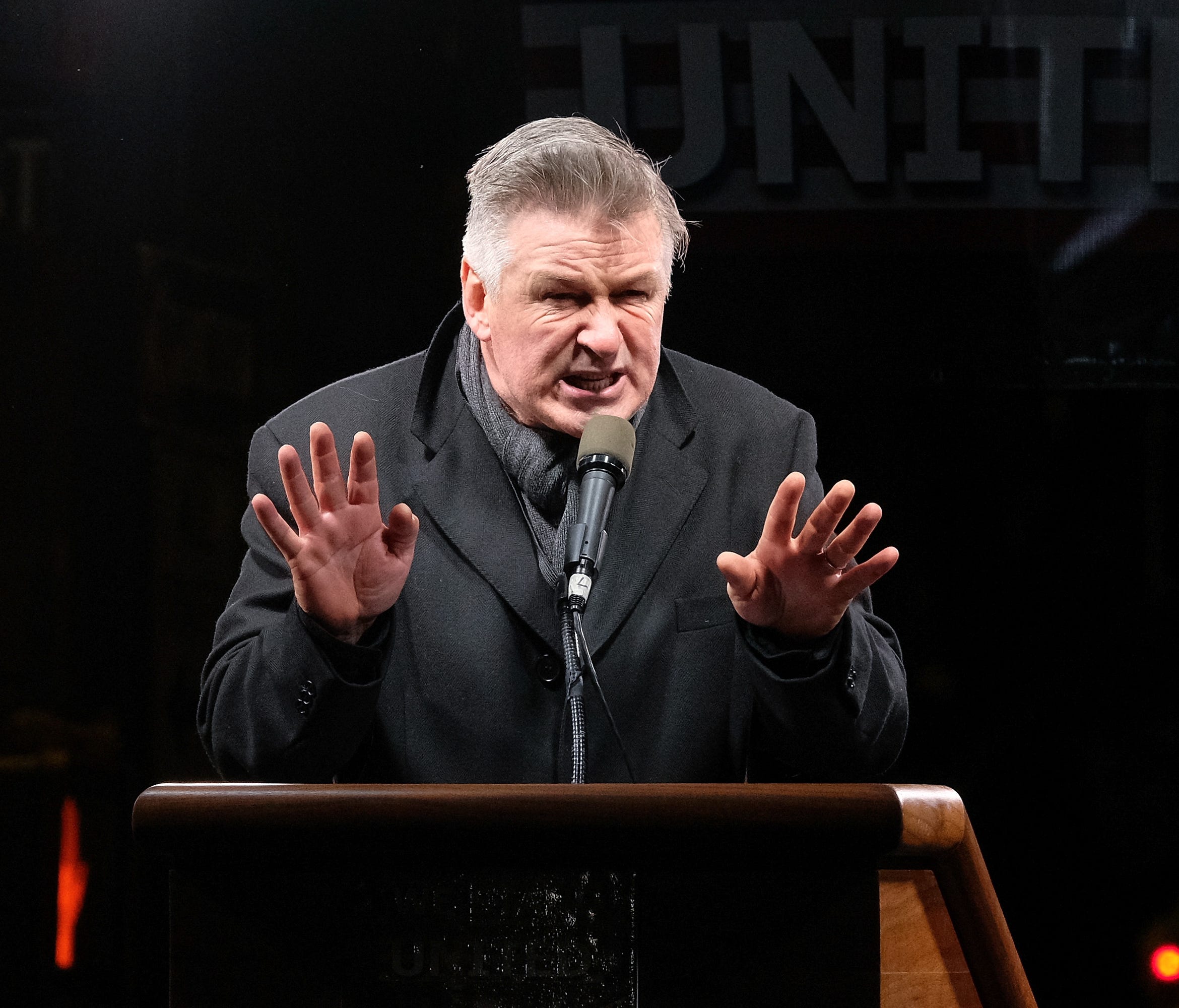 Alec Baldwin speaks onstage during the We Stand United NYC Rally outside Trump International Hotel & Tower on Jan. 19.