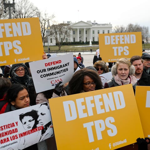 Immigration advocates rally near the White House...