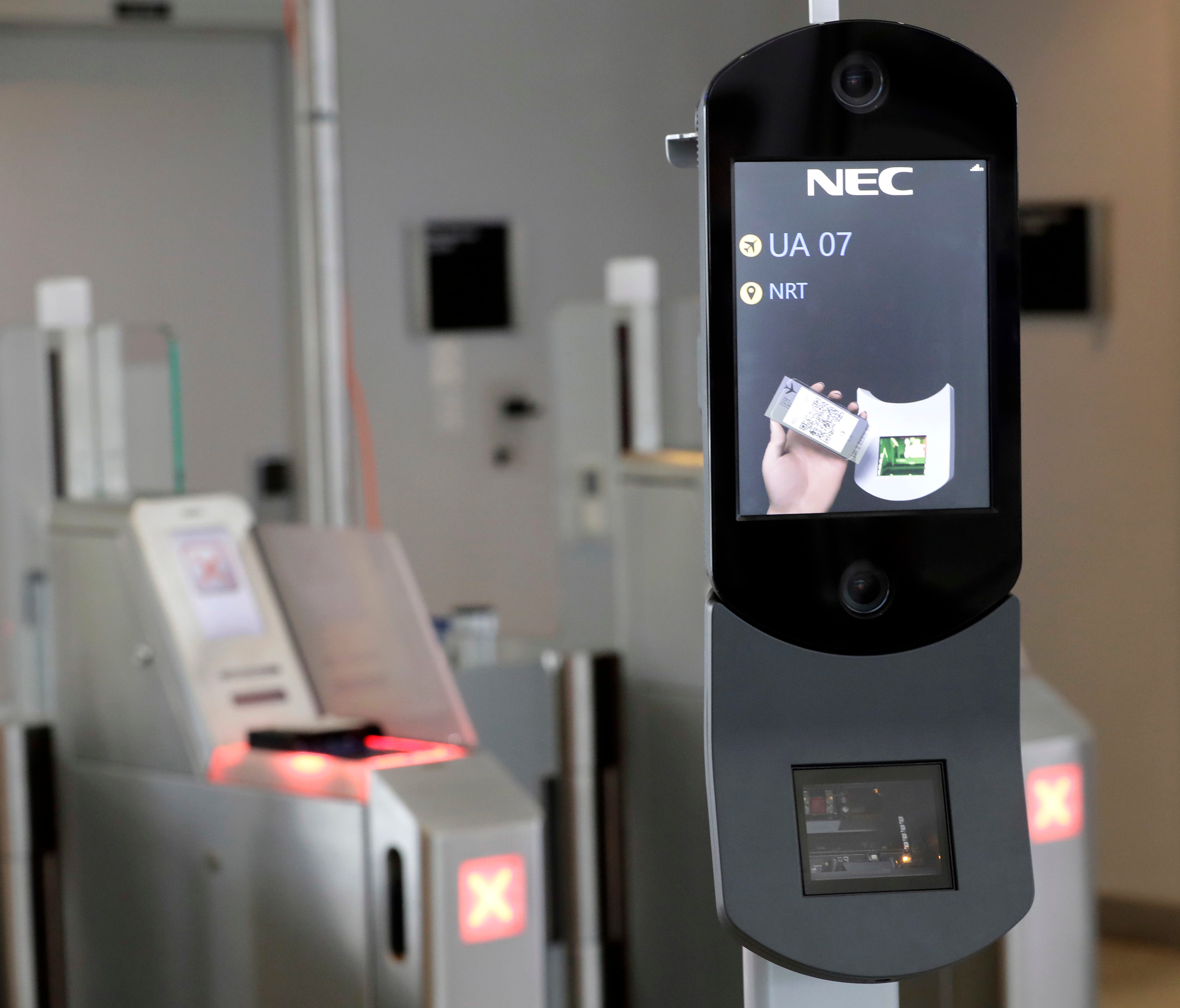 This file photo from July 12, 2017, shows a U.S. Customs and Border Protection facial recognition device at a United Airlines gate at Houston's Bush Intercontinental Airport.