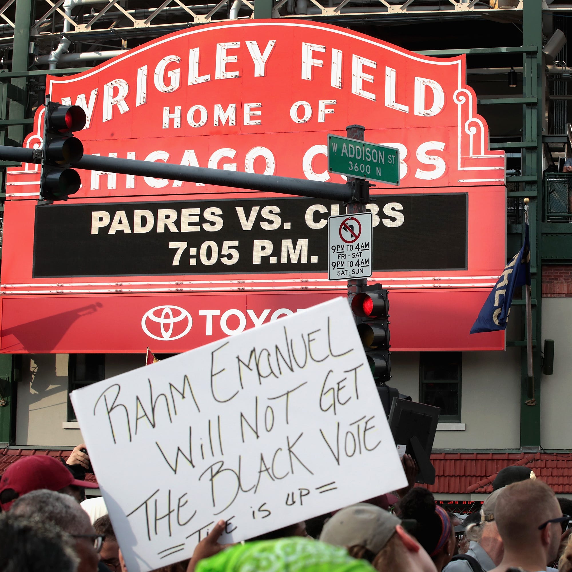 Demonstrators protest in front of Wrigley Field before  the start of the matchup between the Cubs and the Padres on August 2, 2018 in Chicago, Illinois. The demonstrators, who marched from Lake Shore Drive and through the nearby neighborhoods were pr