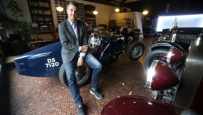 Alexander Davidis, CEO and executive producer of Davidis Film, photographed in a garage housing classic cars below their office in Bedford Hills.