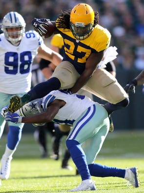 Green Bay Packers running back Eddie Lacy leaps over