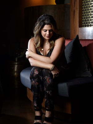 Hillary Scott, of Lady Antebellum, poses at Sinema July 19, 2016 in Nashville, Tenn. Scott talks about her family's gospel album that was prompted following the loss of her grandfather and a pregnancy.