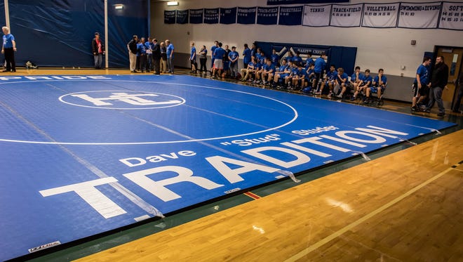 A mat with his name was made for Harper Creek's head varsity wrestling coach Dave Studer for his 50 years of continuous coaching at Harper Creek Wednesday evening. 