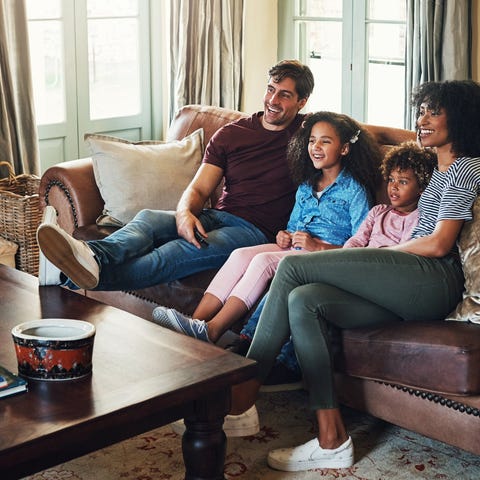 A group of people sitting on the couch.