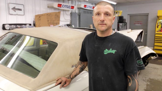 James Harris of Midwest Customs of Howards Grove, Wis., is in the process of fixing the  1979 Lincoln Continental that Taylor Bradford died in after a botched robbery.