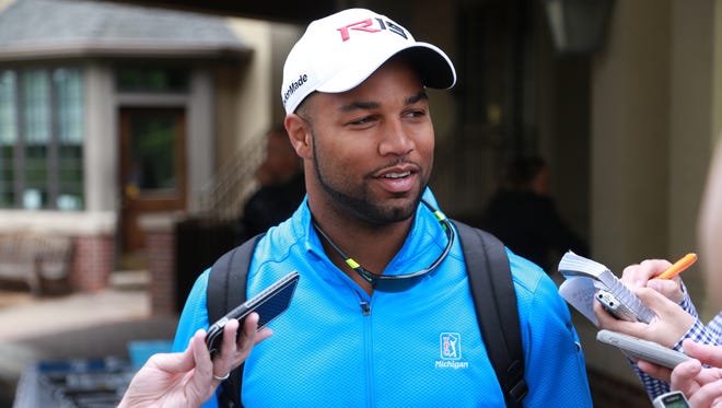 Detroit Lions wide receiver Golden Tate talks with the media during the Charlie Sanders Foundation Golf Outing at Knollwood Country Club in West Bloomfield on 
June 1, 2015.