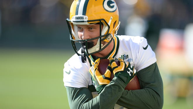 Green Bay Packers receiver Jared Abbrederis catches a ball during a passing drill at training camp at Ray Nitschke Field on Thursday.