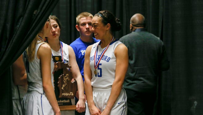 Madison Ayers of the Pittsford Wildcats talks during the press conference after winning the MHSAA girls basketball Class D finals at the Breslin Center in East Lansing on Saturday, March 19, 2016.