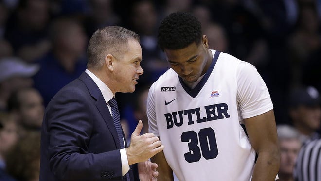 Butler coach Chris Holtmann and Kelan Martin (30) found out their 2016-17 schedule on Tuesday.