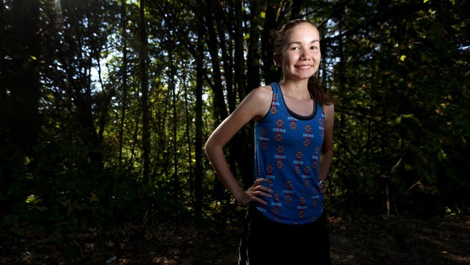 Sophomore Ginger Murnieks, a cross country runner, stands for a portrait at Sprague High School in Salem on Wednesday, Aug. 24, 2016.
