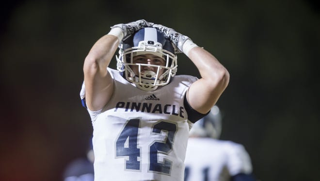Linebacker Hogan Hatten (42) of the Pinnacle Pioneers reacts after a missed interception during the 6A quarter-final football game between the Chandler Wolves and the Pinnacle Pioneers at Chandler High School on Friday, November 10, 2017 in Chandler, Arizona.