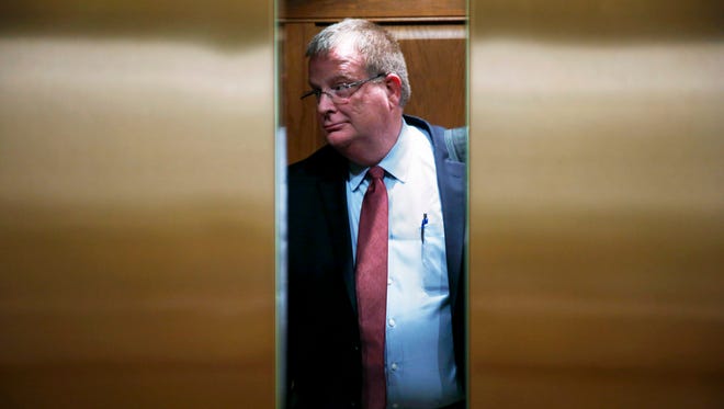 Oregon Health Authority Director Pat Allen stands in an elevator as the doors close in the Oregon Capitol in Salem, Oregon, Monday, Nov. 13, 2017.