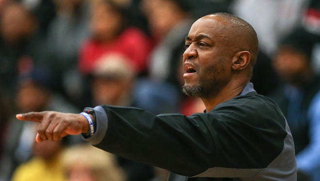 Warren Central Warriors head coach Stacy Mitchell during the first half of sectional finals between the Warren Central Warriors and North Central Panthers at Lawrence North High School in Indianapolis, Ind., Saturday, Feb. 3, 2018.