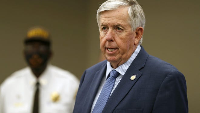 FILE - In this Aug. 6, 2020 file photo, Missouri Gov. Mike Parson speaks during a news conference in St. Louis. Gov. Parson, a Republican who has steadfastly refused to require residents to wear mask, and First Lady Teresa Parson tested positive for COVID-19, Wednesday, Sept. 23, 2020.