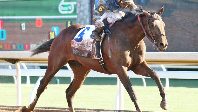Brody's Cause runs to a win in the Blue Grass Stakes at Keeneland.