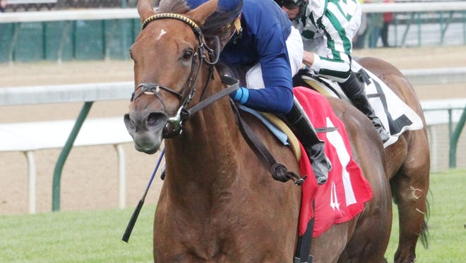 Wesley Ward-trained Acapulco took a rail trip to win Saturday's Unbridled Sidney Stakes at Churchill Downs.