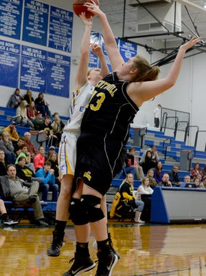 Scotts Hill's Elizabeth Barrow blocks Jackson Christian's Amelia Grizzell during their game Friday.