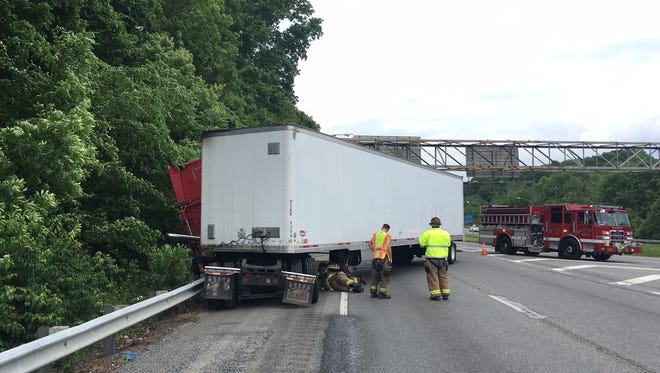 A tractor trailer crash halts traffic on Interstate 495 Sunday evening.