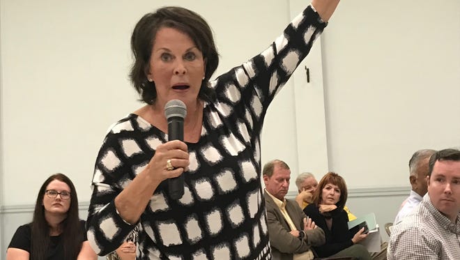 Mary Ann Martin, owner of Roland & Mary Ann Martins Marina & Resort in Clewiston, urges storing water north of Lake Okeechobee during a meeting Monday in Clewiston to discuss a reservoir south of the lake.