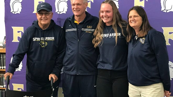 From left to right: Spring Arbor coaches Joe Robertson and Craig Withrow, Sarah Matlock and Spring Arbor coach Deb Thompson. All were in attendance Wednesday as Matlock signed with Spring Arbor.