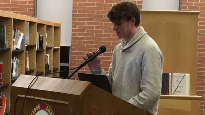 Madison High School senior Mike Quinn addresses the board of education Feb. 27, 2018 about need for district support when students walk out of school on March 14 as part of the National School Walkout calling for increased gun controls.