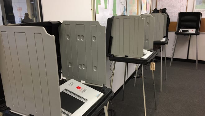 Absentee voting machines in the election room in the Delaware County Building.