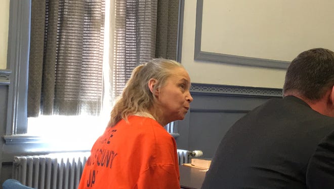 Debra Hartle of Netcong, accused of conspiracy to distribute heroin, in Superior Court, Morristown with attorney Thomas Belsky on April 23, 2018.