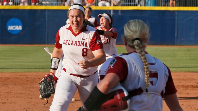 Oklahoma pitcher Paige Parker (8) pumps her fist after closing out the top half of the third inning against Auburn in the deciding game of the championship series of the NCAA softball College World Series, Wednesday, June 8, 2016, in Oklahoma City.(AP Photo/Sue Ogrocki)