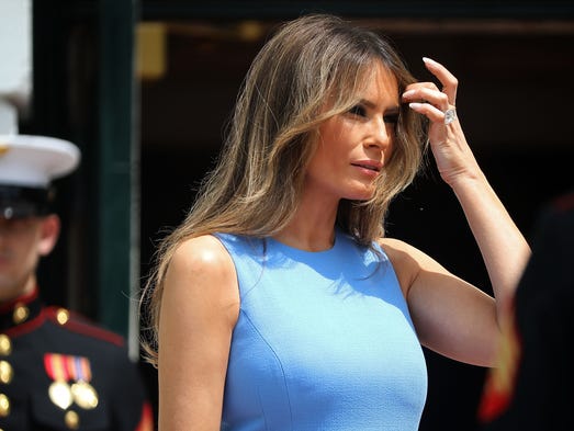 Despite the bright sun, first lady Melania Trump left