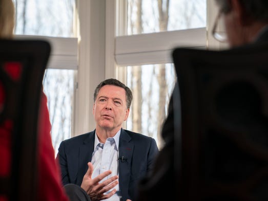 Former FBI director James Comey sits for an interview