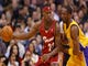 Cleveland rookie LeBron James drives the baseline on