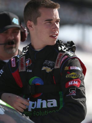 RICHMOND, VA - APRIL 24: Ben Rhodes, driver of the #41 Alpha Energy Solutions Chevrolet, prepares to drive during practice for the NASCAR K&N Pro Series East Blue Ox 100 at Richmond International Raceway on April 24, 2014 in Richmond, Virginia. (Photo by Todd Warshaw/Getty Images)