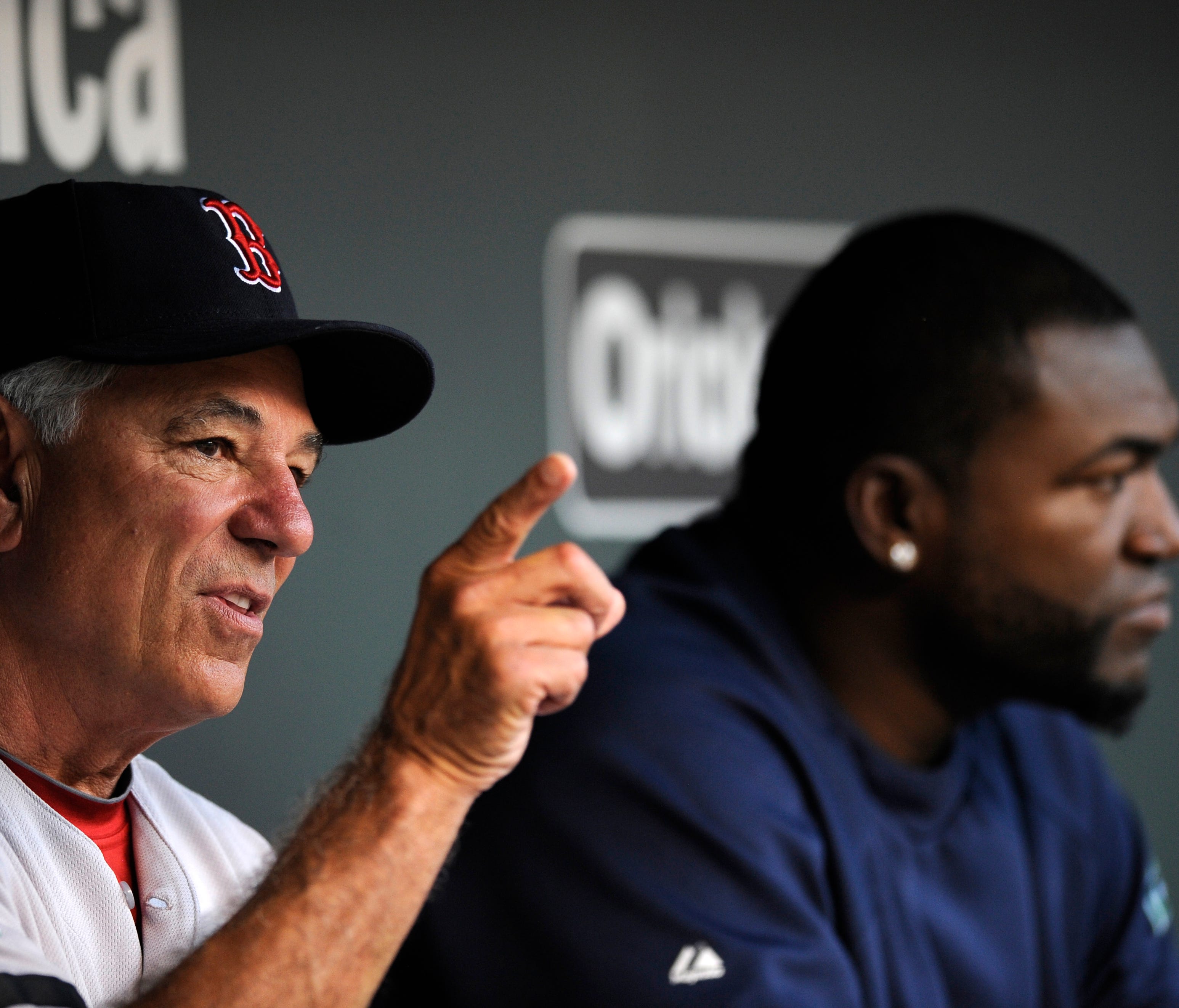 Boston Red Sox manager Bobby Valentine, left, was called out in a new book by David Ortiz, right.