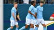 Players celebrate the goal by Manchester City defender