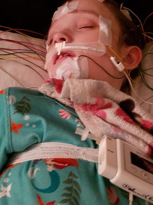 Isabelle Taylor's medical expenses are skyrocketing. The family has a $20,000 request on a GoFundMe account online at bit.ly/3aJnS53. Here she is shown at Savannah Neurology this summer for seizure treatments.