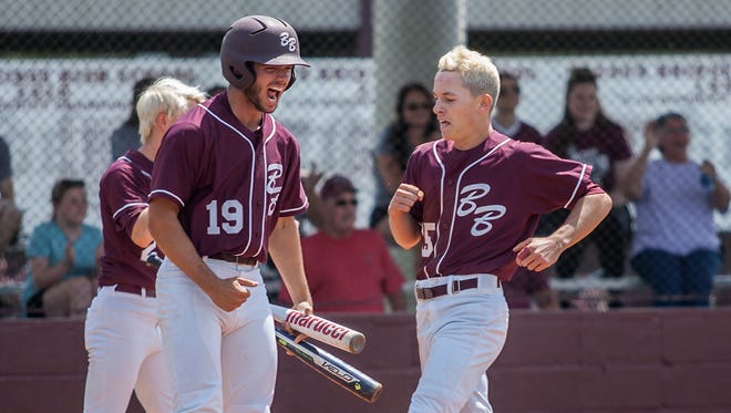 Alex Franks cheers as Alec Laviolette scores on a double by Tyler Thibodeaux to tie the game for Breaux Bridge at 1 on Saturday afternoon.