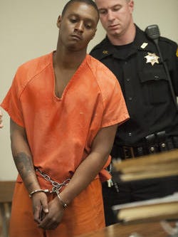 Leon Wilson, then 21, is shown at an April 2014 court hearing after a fatal attack on his mother and her unborn child.