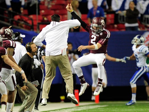 Dec. 31, 2013: Johnny Manziel celebrates a touchdown
