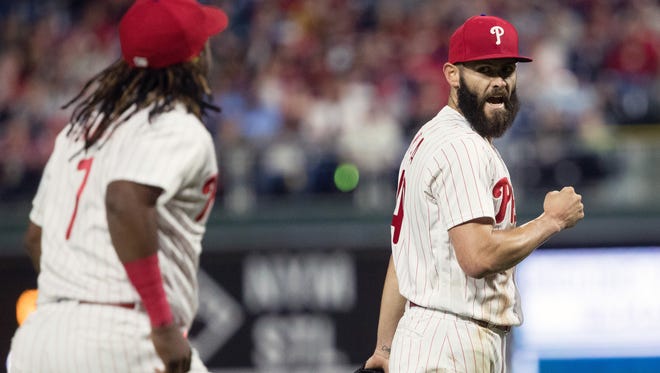 Apr 25, 2018; Philadelphia, PA, USA; Philadelphia Phillies starting pitcher Jake Arrieta (49) reacts with third baseman Maikel Franco (7) after a double to end the fourth inning against the Arizona Diamondbacks at Citizens Bank Park. Mandatory Credit: Bill Streicher-USA TODAY Sports