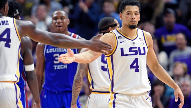 LSU forward Emmitt Williams, left, celebrates with teammate Skylar Mays (4) late in the second half of an NCAA college basketball game, Friday, Nov. 16, 2018, in Baton Rouge, La. LSU won 74-67. (AP Photo/Bill Feig)