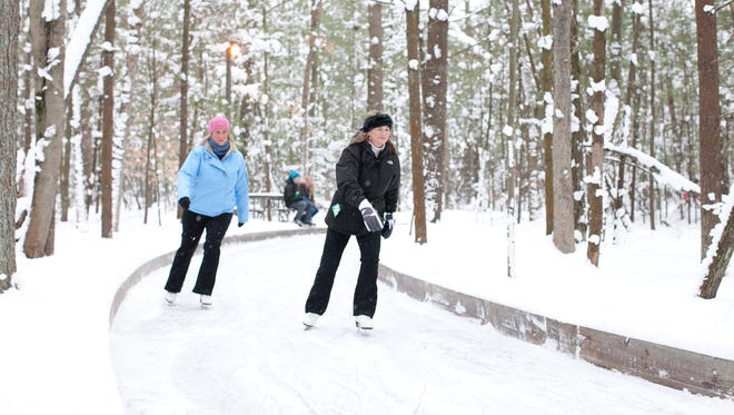 Two of the skating rinks at the Winter Sports Complex are connected by a unique quarter-mile ice-skating trail, which winds through the woods.