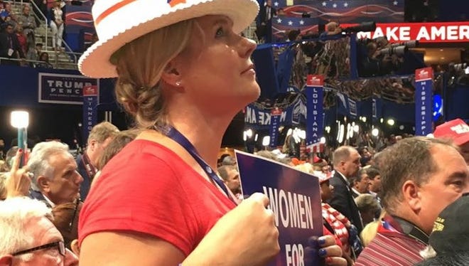 Meshawn Maddock of Milford shows her support for Donald Trump at the Republican National Convention.