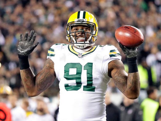 Green Bay Packers linebacker Jayrone Elliott (91) reacts
