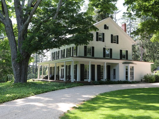The farmhouse at Steepway Farm dates to 1830. Barbara and Tom Israel bought the property in 1980. A huge pachysandra bed sits between the front of the house and Mount Holly Road.