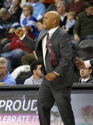 IUPUI head coach Jason Gardner reacts after a basket against Indiana State at the Fairgrounds Coliseum Friday November 14, 2014. 