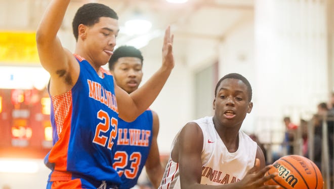 Vineland guard Isiah Blakely (10) passes against Millville at Vineland High School on Wednesday, December 21.