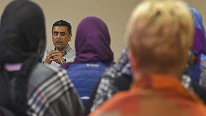 Mohammad Qamar, director of Interfaith Dialogue and Public Outreach for the Muslims Community Center of South Dakota, speaks during a discussion about Islam Friday, Feb. 3, 2017, at the Muslims Community Center of South Dakota in Sioux Falls.